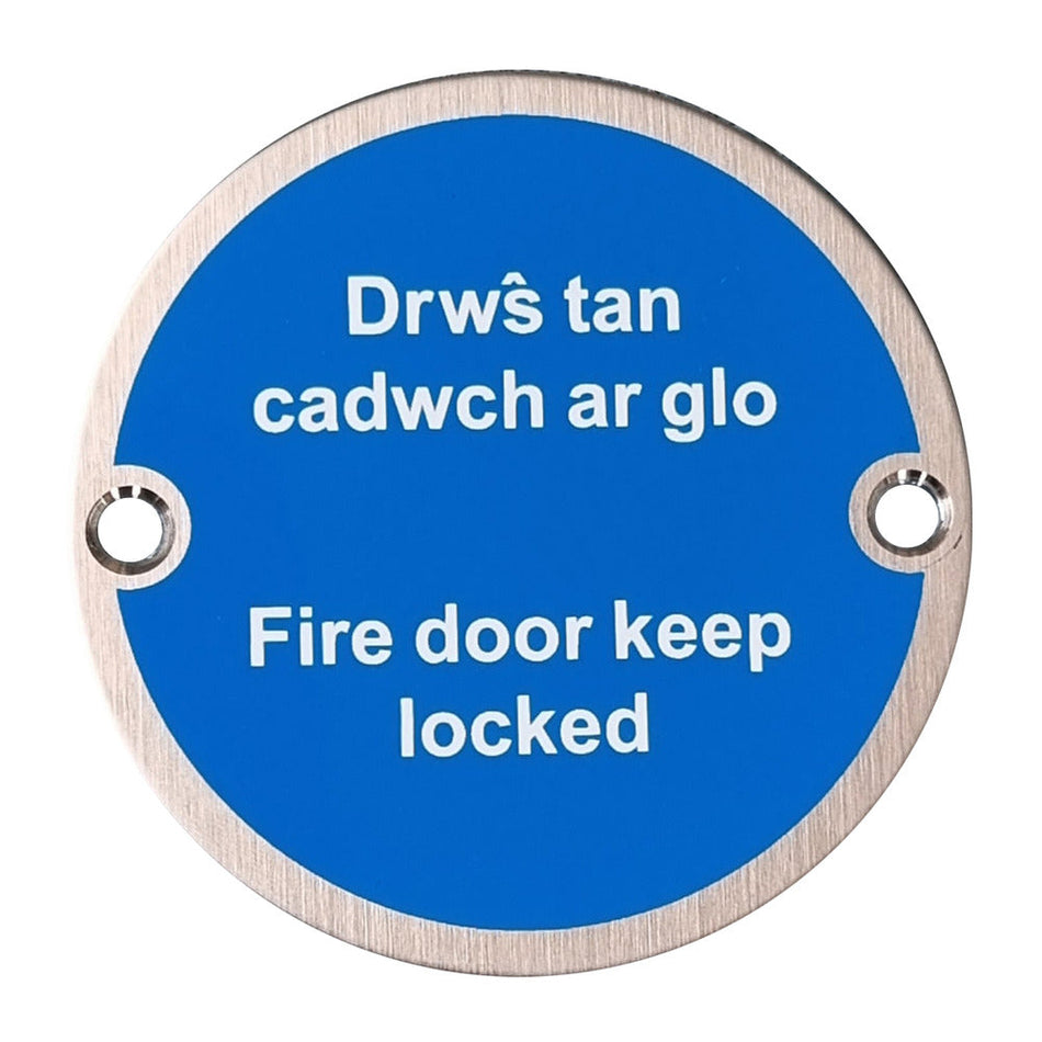 76mm Diameter Fire Door Keep Locked Multi Lingual Sign in Satin Stainless Steel Hardware > Door Signs > Safety Signs > 76mm > One Stop For Safety   